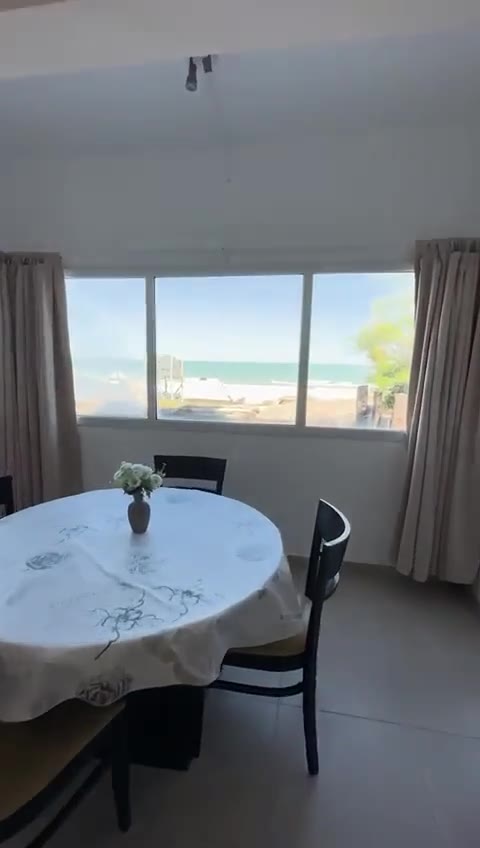 Living y vista al mar de Departamento 12